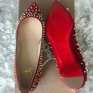 Christian Louboutin red spike flat